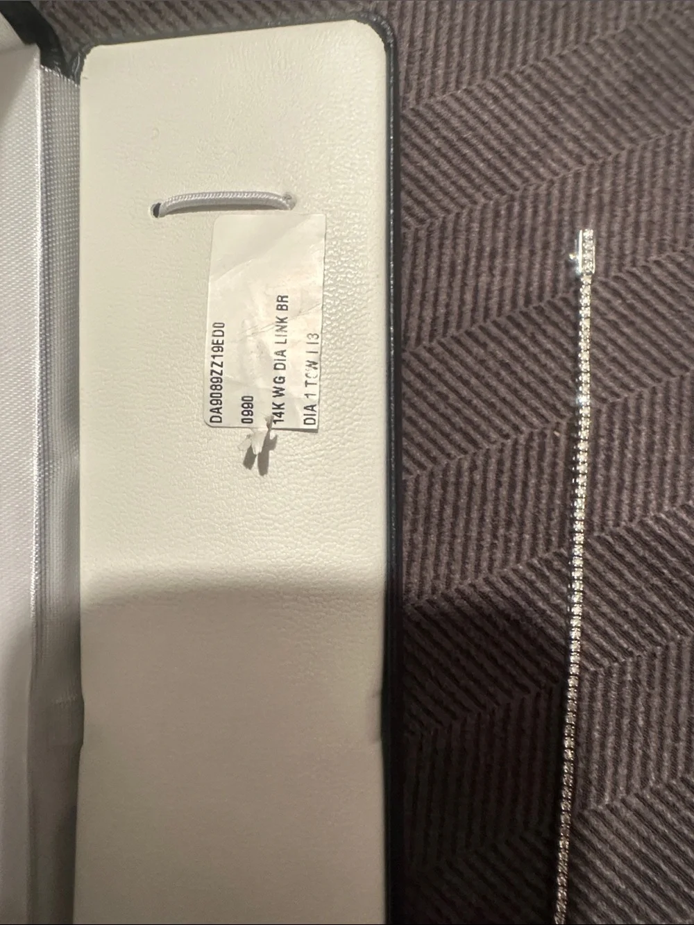 14 K White Gold 1 carat TW Natural Diamond tennis bracelet.